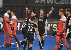 Germany's Mats Grambusch (C) with teammates celebrate a goal against Netherland during the field hockey group stage match between Germany and Netherland at the 2018 Hockey World Cup in Bhubaneswar on December 5, 2018(AFP) Germany's Mats Grambusch (C) with teammates celebrate a goal against Netherland during the field hockey group stage match between Germany and Netherland at the 2018 Hockey World Cup in Bhubaneswar on December 5, 2018(AFP)