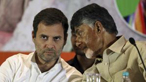 Congress party President Rahul Gandhi, left, listens to Telugu Desam Party (TDP) President and Andhra Pradesh Chief Minister N Chandrababu Naidu during a press conference in Hyderabad on Wednesday.(AP) Congress party President Rahul Gandhi, left, listens to Telugu Desam Party (TDP) President and Andhra Pradesh Chief Minister N Chandrababu Naidu during a press conference in Hyderabad on Wednesday.(AP)