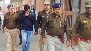 Accused Ashok Kumar in police custody after he was awarded death sentence by a court in Hisar on Wednesday(HT Photo) Accused Ashok Kumar in police custody after he was awarded death sentence by a court in Hisar on Wednesday(HT Photo)