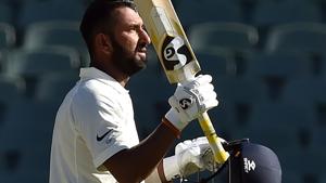 Cheteshwar Pujara celebrates scoring his century during day one of the first Test match against Australia.(AFP) Cheteshwar Pujara celebrates scoring his century during day one of the first Test match against Australia.(AFP)