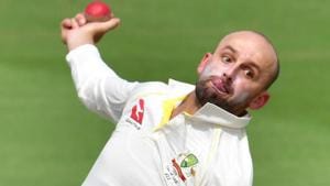 Nathan Lyon bowls during Day 1 of the first Test between India and Australia in Adelaide.(AFP)