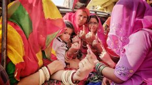 Women show their inked fingers after casting votes in Jaipur on Friday.(Himanshu Vyas/HT photo) Women show their inked fingers after casting votes in Jaipur on Friday.(Himanshu Vyas/HT photo)