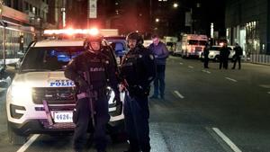 New York City police officers stand by near the Time Warner Center in New York Thursday, Dec. 6, 2018, after a bomb threat was called into the building and occupants were evacuated, including CNN employees. Police units swept the building with the NYPD bomb squad on standby. (AP Photo/Craig Ruttle)(AP) New York City police officers stand by near the Time Warner Center in New York Thursday, Dec. 6, 2018, after a bomb threat was called into the building and occupants were evacuated, including CNN employees. Police units swept the building with the NYPD bomb squad on standby. (AP Photo/Craig Ruttle)(AP)