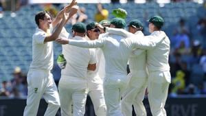 Australia's bowler Pat Cummins (L) celebrates with his teammates after dismissing India's captain Virat Kohli (not pictured) for 3 runs during day one of the first test match between Australia and India at the Adelaide Oval.(REUTERS) Australia's bowler Pat Cummins (L) celebrates with his teammates after dismissing India's captain Virat Kohli (not pictured) for 3 runs during day one of the first test match between Australia and India at the Adelaide Oval.(REUTERS)