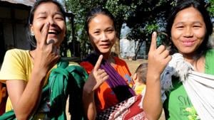 Young-girls-show-their-marked-fingers-after-casting-votes-for-Lok-Sabha-polls-at-a-polling-station-in-Aizawl-Mizoram(PTI) Young-girls-show-their-marked-fingers-after-casting-votes-for-Lok-Sabha-polls-at-a-polling-station-in-Aizawl-Mizoram(PTI)
