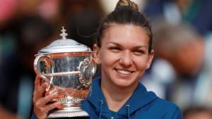 Romania’s Simona Halep celebrates with the French Open trophy at Roland Garros.(REUTERS) Romania’s Simona Halep celebrates with the French Open trophy at Roland Garros.(REUTERS)