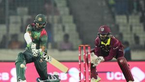 Bangladesh cricketer Shakib Al Hasan (L) plays a shot as the West Indies cricketer Shai Hope (R) looks on during the first One Day International (ODI) between Bangladesh and West Indies at the Sher-e-Bangla National Cricket Stadium in Dhaka.(AFP) Bangladesh cricketer Shakib Al Hasan (L) plays a shot as the West Indies cricketer Shai Hope (R) looks on during the first One Day International (ODI) between Bangladesh and West Indies at the Sher-e-Bangla National Cricket Stadium in Dhaka.(AFP)