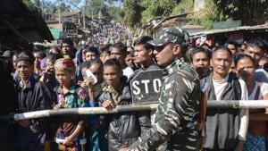 Mizoram assembly elections 2018: Internally displaced Bru Reang tribespeople wait to cross into Mizoram to cast their votes.(AFP file Photo) Mizoram assembly elections 2018: Internally displaced Bru Reang tribespeople wait to cross into Mizoram to cast their votes.(AFP file Photo)