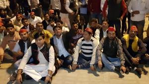 Soon after Anurag Bhadouria was detained, dozens of SP workers held a sit-in at the police station.(HT Photo) Soon after Anurag Bhadouria was detained, dozens of SP workers held a sit-in at the police station.(HT Photo)