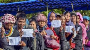 Mizoram elections 2018: Voters show their identity card as they stand in a queue at a polling station during the state Assembly elections, at Kanhmun, Mizoram November 28.(PTI file photo) Mizoram elections 2018: Voters show their identity card as they stand in a queue at a polling station during the state Assembly elections, at Kanhmun, Mizoram November 28.(PTI file photo)