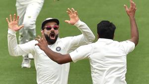 India's captain Virat Kohli (L) celebrates with spin bowler Ravichandran Ashwin (R) after beating Australia on day five of the first Test cricket match at the Adelaide Oval on December 10, 2018(AFP) India's captain Virat Kohli (L) celebrates with spin bowler Ravichandran Ashwin (R) after beating Australia on day five of the first Test cricket match at the Adelaide Oval on December 10, 2018(AFP)