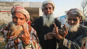 Voters show their fingers marked with indelible ink after voting in the 8th phase of Panchayat elections, at Bajalta village in Jammu.(PTI) Voters show their fingers marked with indelible ink after voting in the 8th phase of Panchayat elections, at Bajalta village in Jammu.(PTI)