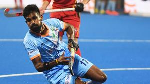 India's Sumit (C) tries to dribble past Belgium's Tom Boon during the field hockey group stage match between India and Belgium at the 2018 Hockey World in Bhubaneswar.(AFP) India's Sumit (C) tries to dribble past Belgium's Tom Boon during the field hockey group stage match between India and Belgium at the 2018 Hockey World in Bhubaneswar.(AFP)