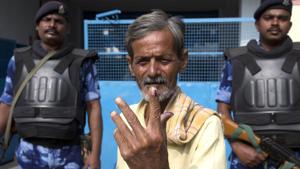 A man displays the indelible ink mark on his index fingers after casting his vote in Hyderabad, India, Friday, Dec. 7, 2018. This is the first state elections in Telangana after it was formed bifurcating Indian state of Andhra Pradesh.(AP) A man displays the indelible ink mark on his index fingers after casting his vote in Hyderabad, India, Friday, Dec. 7, 2018. This is the first state elections in Telangana after it was formed bifurcating Indian state of Andhra Pradesh.(AP)