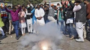 Madhya Pradesh election result: Congress supporters celebrate at the party headquarters in Bhopal.(Burhaan Kinu/HT Photo) Madhya Pradesh election result: Congress supporters celebrate at the party headquarters in Bhopal.(Burhaan Kinu/HT Photo)
