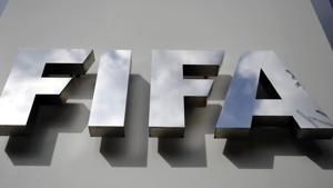 ZURICH, SWITZERLAND - OCTOBER 09: A FIFA logo next to the entrance at the FIFA headquarters on October 9, 2015 in Zurich, Switzerland. On Thursday, FIFA's Ethics Committee provisionally banned FIFA President Joseph S. Blatter from all football activities for the duration of 90 days. (Photo by Harold Cunningham/Getty Images)(Getty Images) ZURICH, SWITZERLAND - OCTOBER 09: A FIFA logo next to the entrance at the FIFA headquarters on October 9, 2015 in Zurich, Switzerland. On Thursday, FIFA's Ethics Committee provisionally banned FIFA President Joseph S. Blatter from all football activities for the duration of 90 days. (Photo by Harold Cunningham/Getty Images)(Getty Images)