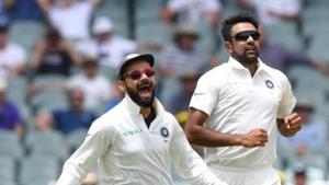 India's captain Virat Kohli and his teammate Ravichandran Ashwin celebrate the dismissal of Australia's Marcus Harris during day two of the first test match between Australia and India at the Adelaide Oval.(REUTERS) India's captain Virat Kohli and his teammate Ravichandran Ashwin celebrate the dismissal of Australia's Marcus Harris during day two of the first test match between Australia and India at the Adelaide Oval.(REUTERS)