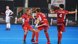 Belgium's Victor Wegnez (L) celebrates with teammates Gauthier Boccard (C) and Arthur van Doren their win over Germany after their field hockey quarter-final match between Germany and Belgium at the 2018 Hockey World Cup in Bhubaneswar on December 13, 2018. (Photo by Dibyangshu SARKAR / AFP)(AFP) Belgium's Victor Wegnez (L) celebrates with teammates Gauthier Boccard (C) and Arthur van Doren their win over Germany after their field hockey quarter-final match between Germany and Belgium at the 2018 Hockey World Cup in Bhubaneswar on December 13, 2018. (Photo by Dibyangshu SARKAR / AFP)(AFP)
