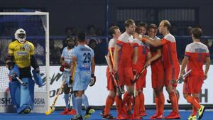 Netherlands players, in orange, celebrate after scoring a goal during the Men's Hockey World Cup quarterfinal match between India and Netherlands at Kalinga Stadium in Bhubaneswar.(AP)