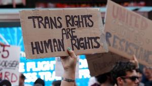 People protest U.S. President Donald Trump's announcement that he plans to reinstate a ban on transgender individuals from serving in any capacity in the U.S. military, in Times Square, in New York.(REUTERS) People protest U.S. President Donald Trump's announcement that he plans to reinstate a ban on transgender individuals from serving in any capacity in the U.S. military, in Times Square, in New York.(REUTERS)