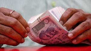 On Thursday the rupee appreciated by 33 paise to 71.68 per US dollar.(REUTERS) On Thursday the rupee appreciated by 33 paise to 71.68 per US dollar.(REUTERS)