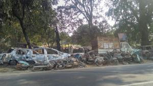 Charred remains of vehicles which were set on fire by a mob over alleged cow slaughter in Bulandshahr.(PTI/File Photo) Charred remains of vehicles which were set on fire by a mob over alleged cow slaughter in Bulandshahr.(PTI/File Photo)
