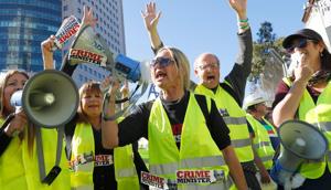Israeli protesters wearing yellow vests use loudspeakers to shout slogans during demonstrations against the rising cost of living on December 14, 2018, in the Israeli coastal city of Tel Aviv.(AFP/Representative Image) Israeli protesters wearing yellow vests use loudspeakers to shout slogans during demonstrations against the rising cost of living on December 14, 2018, in the Israeli coastal city of Tel Aviv.(AFP/Representative Image)
