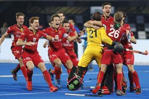Belgium players celebrate their win over Netherlands in the Men's Hockey World Cup finals at Kalinga Stadium in Bhubaneswar, India.(AP) Belgium players celebrate their win over Netherlands in the Men's Hockey World Cup finals at Kalinga Stadium in Bhubaneswar, India.(AP)
