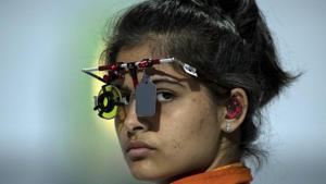 Manu Bhaker of India competes in the shooting 10m air pistol mixed international team event.(AP) Manu Bhaker of India competes in the shooting 10m air pistol mixed international team event.(AP)