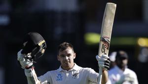 New Zealand's Tom Latham celebrates after scoring a century during play on day two of the first cricket test between New Zealand and Sri Lanka in Wellington, New Zealand, Sunday, Dec. 16, 2018(AP) New Zealand's Tom Latham celebrates after scoring a century during play on day two of the first cricket test between New Zealand and Sri Lanka in Wellington, New Zealand, Sunday, Dec. 16, 2018(AP)