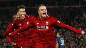 Liverpool's Xherdan Shaqiri celebrates scoring their third goal with Roberto Firmino and Georginio Wijnaldum.(REUTERS) Liverpool's Xherdan Shaqiri celebrates scoring their third goal with Roberto Firmino and Georginio Wijnaldum.(REUTERS)