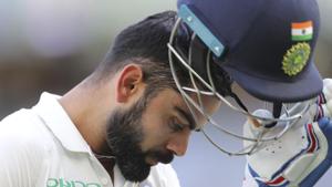 India's Virat Kohli removes his helmet as he walks off after being dismissed during play in the second cricket test between Australia and India in Perth, Australia, Monday, Dec. 17, 2018(AP) India's Virat Kohli removes his helmet as he walks off after being dismissed during play in the second cricket test between Australia and India in Perth, Australia, Monday, Dec. 17, 2018(AP)