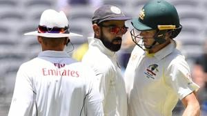 India's captain Virat Kohli (C) and Australia's captain Tim Paine react after Paine ran a single in Perth.(REUTERS) India's captain Virat Kohli (C) and Australia's captain Tim Paine react after Paine ran a single in Perth.(REUTERS)