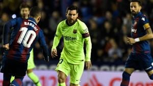 Levante's Macedonian midfielder Enis Bardhi (L) vies with Barcelona's Argentinian forward Lionel Messi during the Spanish League football match between Levante and Barcelona at the Ciutat de Valencia stadium in Valencia.(AFP) Levante's Macedonian midfielder Enis Bardhi (L) vies with Barcelona's Argentinian forward Lionel Messi during the Spanish League football match between Levante and Barcelona at the Ciutat de Valencia stadium in Valencia.(AFP)