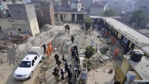 Two children were killed after the boundary wall of a private school in Noida’s Salarpur village collapsed on Monday December 17, 2018.(Sunil Ghosh / HT Photo) Two children were killed after the boundary wall of a private school in Noida’s Salarpur village collapsed on Monday December 17, 2018.(Sunil Ghosh / HT Photo)