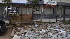 The civic authorities demolished a temple near Aranyeshwar road on Monday.(RAVINDRA JOSHI/HT PHOTO) The civic authorities demolished a temple near Aranyeshwar road on Monday.(RAVINDRA JOSHI/HT PHOTO)