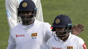 Sri Lanka's Angelo Mathews, left, and Kusal Mendis leave the field at the close of play.(AP) Sri Lanka's Angelo Mathews, left, and Kusal Mendis leave the field at the close of play.(AP)