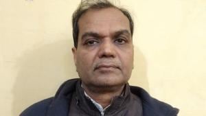 Sunil Gupta (in picture), his wife Radha and son Abhishek, were produced in a court here after they were held from their Navi Mumbai residence on December 17, the police said.(HT Photo)