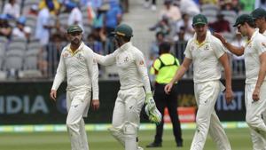 Australia's Nathan Lyon, left, is congratulated by skipper Tim Paine after he took five wickets in India's first innings in the second cricket test between Australia and India in Perth, Australia, Sunday, Dec. 16, 2018(AP) Australia's Nathan Lyon, left, is congratulated by skipper Tim Paine after he took five wickets in India's first innings in the second cricket test between Australia and India in Perth, Australia, Sunday, Dec. 16, 2018(AP)