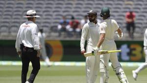 Virat Kohli (centre) and Tim Paine exchange a friendly banter during the second Test in Perth.(AP) Virat Kohli (centre) and Tim Paine exchange a friendly banter during the second Test in Perth.(AP)