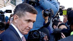 Former US national security adviser Michael Flynn passes by members of the media as he departs after his sentencing was delayed at U.S. District Court in Washington, US on December 18.(REUTERS) Former US national security adviser Michael Flynn passes by members of the media as he departs after his sentencing was delayed at U.S. District Court in Washington, US on December 18.(REUTERS)