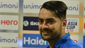 Afghan cricketer Rashid Khan poses with his award of 'Player Of The Match' after victory in the one day international (ODI) Asia Cup cricket match between Bangladesh and Afghanistan at The Sheikh Zayed Stadium in Abu Dhabi on September 20, 2018. - Afghanistan won by 136 runs. (Photo by ISHARA S. KODIKARA / AFP)(AFP) Afghan cricketer Rashid Khan poses with his award of 'Player Of The Match' after victory in the one day international (ODI) Asia Cup cricket match between Bangladesh and Afghanistan at The Sheikh Zayed Stadium in Abu Dhabi on September 20, 2018. - Afghanistan won by 136 runs. (Photo by ISHARA S. KODIKARA / AFP)(AFP)