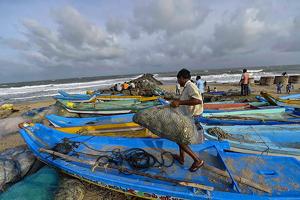 Fishermen dock their boats as a precautionary measure ahead of the arrival of cyclone 'Gaja', in Chennai. Image for representation purpose only.(PTI file photo) Fishermen dock their boats as a precautionary measure ahead of the arrival of cyclone 'Gaja', in Chennai. Image for representation purpose only.(PTI file photo)
