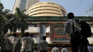 People look at a screen displaying the Sensex results on the facade of the Bombay Stock Exchange (BSE) building in Mumbai.(Reuters file photo) People look at a screen displaying the Sensex results on the facade of the Bombay Stock Exchange (BSE) building in Mumbai.(Reuters file photo)