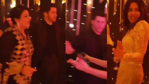 Madhu Chopra and Nick Jonas dancing together at his wedding reception in Mumbai.(Instagram) Madhu Chopra and Nick Jonas dancing together at his wedding reception in Mumbai.(Instagram)