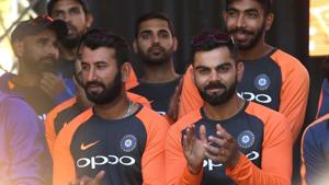 India's captain Virat Kohli (front R) applauds during a meet the fans event in Melbourne on December 23, 2018, ahead of the third cricket Test match against Australia(AFP)