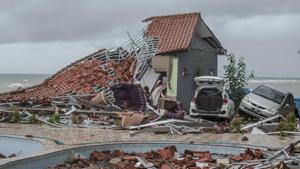 Debris littered a property badly damaged by a tsunami in Carita, Indonesia.(AP) Debris littered a property badly damaged by a tsunami in Carita, Indonesia.(AP)