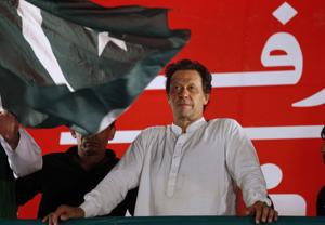 Pakistan’s Prime Minister Imran Khan on Tuesday again tried to compare the treatment of minorities in his country and India, saying these communities would be treated as equal citizens in “Naya Pakistan”, “unlike what is happening in India”.(AP) Pakistan’s Prime Minister Imran Khan on Tuesday again tried to compare the treatment of minorities in his country and India, saying these communities would be treated as equal citizens in “Naya Pakistan”, “unlike what is happening in India”.(AP)