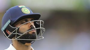 Virat Kohli walks off after being dismissed during play in the second cricket test between Australia and India in Perth.(AP) Virat Kohli walks off after being dismissed during play in the second cricket test between Australia and India in Perth.(AP)