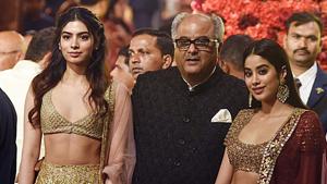 Boney Kapoor (C) with his daughters Khushi (L) and Janhvi Kapoor (R), attend the wedding of Isha Ambani with Anand Piramal in Mumbai. (Photo by - / AFP)(AFP) Boney Kapoor (C) with his daughters Khushi (L) and Janhvi Kapoor (R), attend the wedding of Isha Ambani with Anand Piramal in Mumbai. (Photo by - / AFP)(AFP)